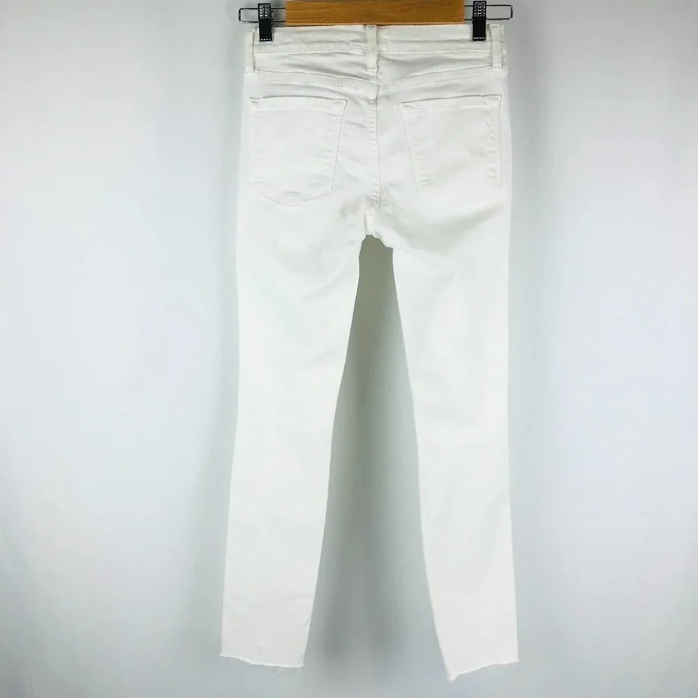 NWOT FRAME LE SKINNY DE JEANNE DISTRESSED RAW HEM JEAN 27